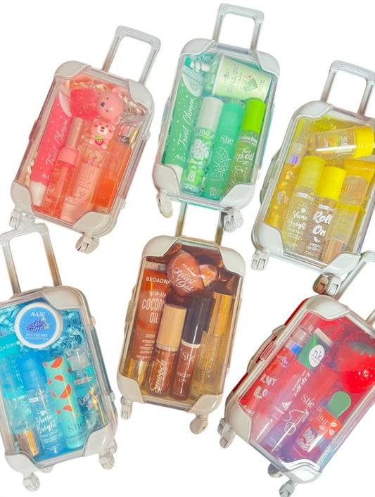 Mini Suitcase  Lip Glos Bundle ( lip oil, lip gloss, lip balm + scrunchie + random hydrating lip mask ).
