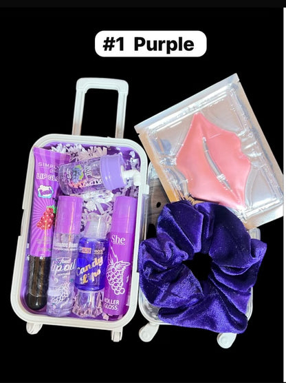 Mini Suitcase  Lip Glos Bundle ( lip oil, lip gloss, lip balm + scrunchie + random hydrating lip mask ).