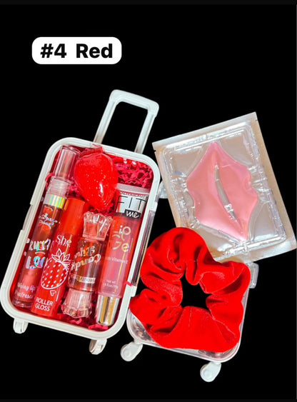 Mini Suitcase  Lip Glos Bundle ( lip oil, lip gloss, lip balm + scrunchie + random hydrating lip mask ).