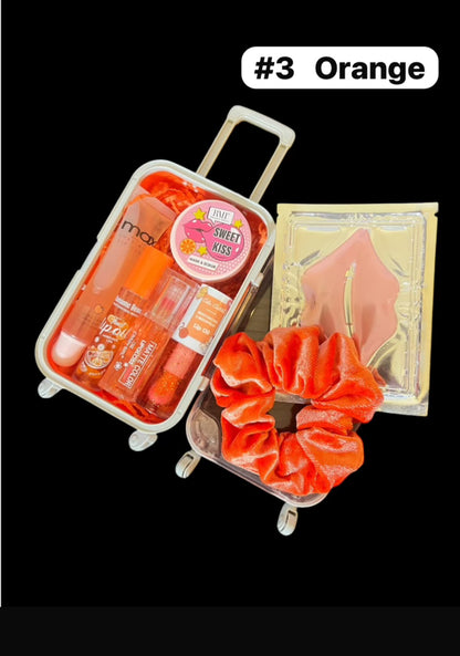 Mini Suitcase  Lip Glos Bundle ( lip oil, lip gloss, lip balm + scrunchie + random hydrating lip mask ).